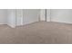 Bedroom with neutral paint and large windows at 6350 Summer Pl, Douglasville, GA 30135