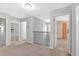 Upstairs hallway providing access to bedrooms and bathrooms at 6350 Summer Pl, Douglasville, GA 30135