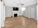 Spacious living room featuring a fireplace and stairs at 6350 Summer Pl, Douglasville, GA 30135