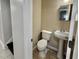 Powder room features a pedestal sink, tile flooring, and a convenient layout at 3011 Flat Shoals Sw Rd, Conyers, GA 30094