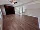 Spacious bedroom with vaulted ceilings, wood-look floors, and an abundance of natural light at 3011 Flat Shoals Sw Rd, Conyers, GA 30094