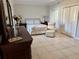 Relaxing bedroom showcasing neutral colors and a spacious closet at 3011 Flat Shoals Sw Rd, Conyers, GA 30094