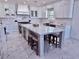 Gourmet kitchen featuring an oversized island, stainless steel appliances, and ample counter space at 3011 Flat Shoals Sw Rd, Conyers, GA 30094