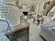 Beautiful living room with marble floors, tasteful decor, and a view of the staircase at 3011 Flat Shoals Sw Rd, Conyers, GA 30094