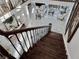 Inviting foyer view overlooking the living room with wood stairs and iron railing; bright with lots of natural light at 3011 Flat Shoals Sw Rd, Conyers, GA 30094