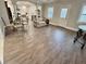 Spacious living room opens to kitchen; tiled floors and light-filled; an open-concept design at 3011 Flat Shoals Sw Rd, Conyers, GA 30094