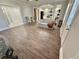 Spacious living room opens to kitchen; tiled floors and light-filled; an open-concept design at 3011 Flat Shoals Sw Rd, Conyers, GA 30094