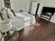 The bedroom boasts hardwood floors, natural light, and a calming color scheme at 3011 Flat Shoals Sw Rd, Conyers, GA 30094