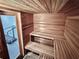 Beautiful wood sauna room featuring built-in benches and a nearby exercise area at 3011 Flat Shoals Sw Rd, Conyers, GA 30094
