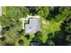 Aerial view of the home featuring mature trees, a well-maintained yard, and convenient neighborhood at 6538 N Sweetwater Rd, Lithia Springs, GA 30122