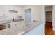 Stylish kitchen featuring granite countertops, modern stainless steel appliances, and white cabinets at 1601 Augusta Se Dr, Marietta, GA 30067