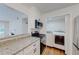 Well-equipped kitchen featuring stainless steel appliances, granite countertops, and a view to the laundry room at 1601 Augusta Se Dr, Marietta, GA 30067