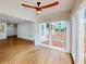 Bright sun room featuring hardwood floors, modern fan and large windows that offer great natural light at 1601 Augusta Se Dr, Marietta, GA 30067