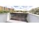 A sunny balcony offering views of the surrounding neighborhood and community at 300 Johnson Ferry Ne Rd # B604, Atlanta, GA 30328