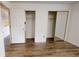 Bedroom with new wood flooring and closet space at 300 Johnson Ferry Ne Rd # B604, Atlanta, GA 30328