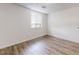Cozy bedroom with wood-look floors and a bright window, creating a relaxing atmosphere at 300 Johnson Ferry Ne Rd # B604, Atlanta, GA 30328
