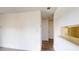 Bright hallway featuring wood floors and access to kitchen at 300 Johnson Ferry Ne Rd # B604, Atlanta, GA 30328