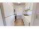 Bright kitchen with white cabinets and stainless steel appliances at 300 Johnson Ferry Ne Rd # B604, Atlanta, GA 30328