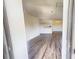 Inviting open-concept living room featuring updated wood-look flooring and lots of natural light at 300 Johnson Ferry Ne Rd # B604, Atlanta, GA 30328