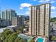 High-rise condo featuring city views, a swimming pool, and a tennis court at 325 E Paces Ferry Ne Rd # 703, Atlanta, GA 30305