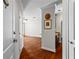 Welcoming entryway with hardwood floors that lead into a living area and kitchen bar at 325 E Paces Ferry Ne Rd # 703, Atlanta, GA 30305