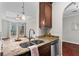 Granite countertop in the kitchen provides bar seating and a view to the balcony at 325 E Paces Ferry Ne Rd # 703, Atlanta, GA 30305