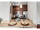 Kitchen features granite countertops, stainless steel appliances, and dark cabinets at 325 E Paces Ferry Ne Rd # 703, Atlanta, GA 30305