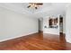 Bright and airy living room featuring hardwood floors and an eat-in kitchen at 325 E Paces Ferry Ne Rd # 703, Atlanta, GA 30305