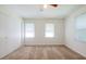Bedroom with large closet, two windows, and plush carpeting at 4150 Glenn St, Powder Springs, GA 30127