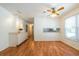 A sunlit dining area features wood floors and a convenient pass-through to the kitchen at 4150 Glenn St, Powder Springs, GA 30127