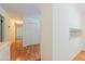 A hallway leads to an open dining area, creating an inviting flow within the home at 4150 Glenn St, Powder Springs, GA 30127