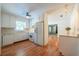 A bright kitchen features white appliances and a breakfast bar, adding functionality to the space at 4150 Glenn St, Powder Springs, GA 30127