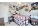 Cozy bedroom featuring carpet flooring, a ceiling fan, and decorated walls at 8870 Dornoch Cir, Winston, GA 30187