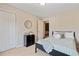 Cozy bedroom with natural light, neutral walls, carpeted floors and an ensuite bathroom and walk in closet at 1087 Berkley Se Dr, Smyrna, GA 30082