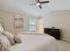 Spacious bedroom featuring soft lighting, neutral walls, carpeted floors, comfortable furnishings and relaxing decor at 1087 Berkley Se Dr, Smyrna, GA 30082