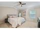 Tranquil bedroom featuring soft lighting, neutral walls, carpeted floors, comfortable furnishings and relaxing decor at 1087 Berkley Se Dr, Smyrna, GA 30082