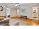 Spacious living room with hardwood floors, neutral walls, and views into the bedroom and bathroom for a serene atmosphere at 1087 Berkley Se Dr, Smyrna, GA 30082