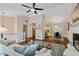 Bright living room with hardwood flooring, a fireplace, and an open floor plan at 1087 Berkley Se Dr, Smyrna, GA 30082