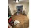 View of open-concept dining room with hardwood floors and bright natural light at 2463 Stone Rd, East Point, GA 30344