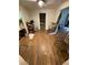 View of open-concept floorplan, hardwood floors, and bright natural light at 2463 Stone Rd, East Point, GA 30344