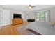 Inviting main bedroom with bay windows, a stylish dresser, and a comfortable king-size bed at 285 Sw Martin Sw Way, Marietta, GA 30064