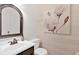Chic powder room featuring modern fixtures and a stylish accent wall at 285 Sw Martin Sw Way, Marietta, GA 30064