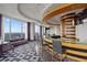 Modern bar and lounge area with floor-to-ceiling windows and elegant furnishings at 3338 Peachtree Rd # 2005, Atlanta, GA 30326