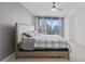 Comfortable bedroom with a city view, featuring a cozy bed, soft carpet, and abundant natural light at 3338 Peachtree Rd # 2005, Atlanta, GA 30326