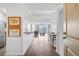 Inviting entryway boasts hardwood floors, with art and a view into the living area, creating an open feel at 3338 Peachtree Rd # 2005, Atlanta, GA 30326