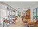 Bright lounge area with large windows, comfortable seating, and a bar, perfect for relaxation and social gatherings at 3338 Peachtree Rd # 2005, Atlanta, GA 30326