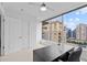 Cozy office space with city views from the floor-to-ceiling windows, featuring bright white walls at 3338 Peachtree Rd # 2005, Atlanta, GA 30326