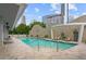 Inviting outdoor pool surrounded by lounge chairs, landscaping, and city views at 3338 Peachtree Rd # 2005, Atlanta, GA 30326