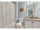 Bathroom with shower and tub with a shower curtain at 3925 Sheldon Ne Dr, Atlanta, GA 30342