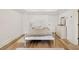Bedroom features hardwood floors, white trim, neutral color palette, and natural light at 3925 Sheldon Ne Dr, Atlanta, GA 30342